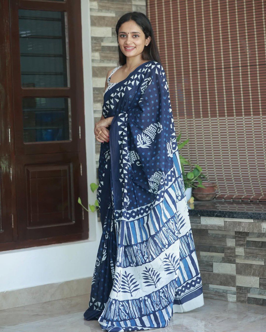 Ready to wear dark blue cotton saree with white floral print – stitched designer saree for women