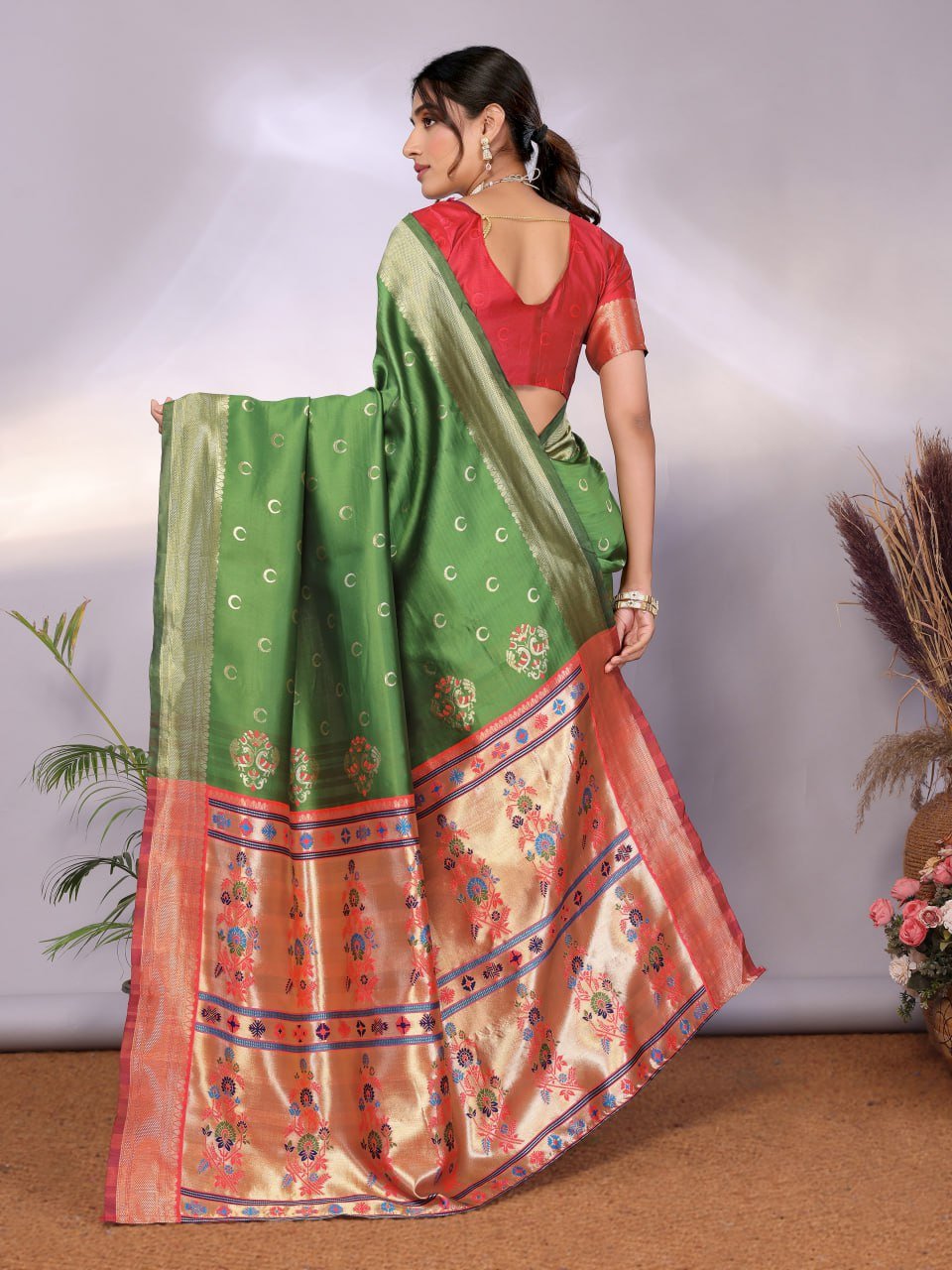 Leaf Green And Orange Banarasi Soft Silk Saree