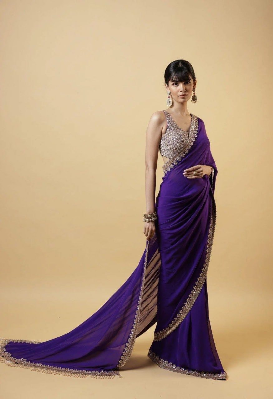Woman wearing purple faux georgette saree with gold embroidery – festive designer saree for women