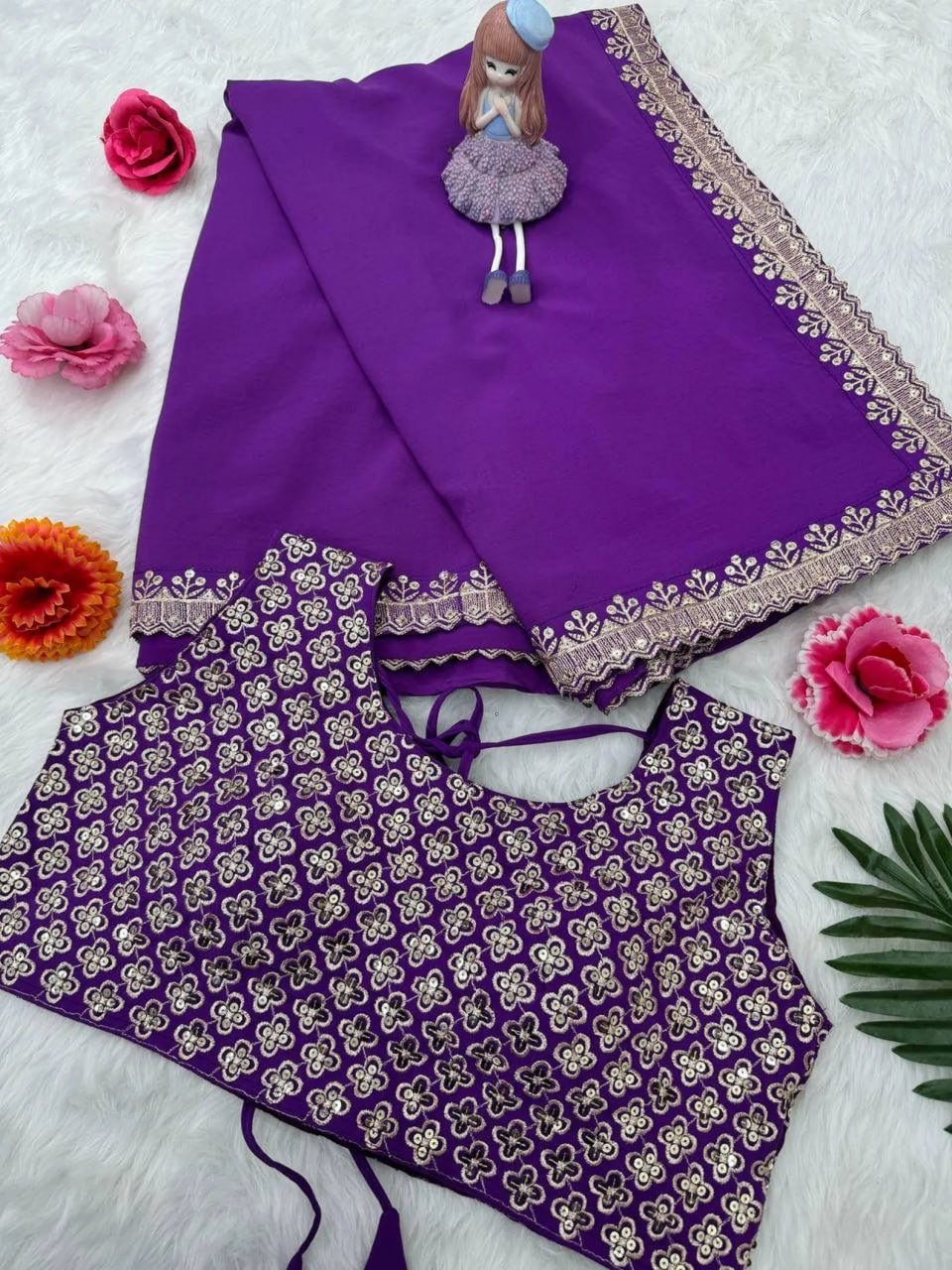Folded purple faux georgette saree with gold thread embroidery – elegant designer saree for weddings