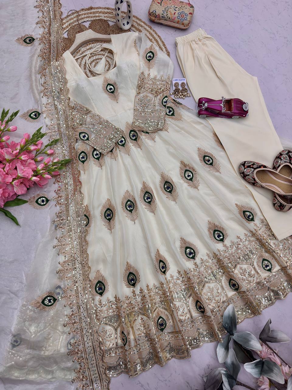 White Heavy Fandy Silk Embroidery Threads And Zari Sequins Work Suit Set