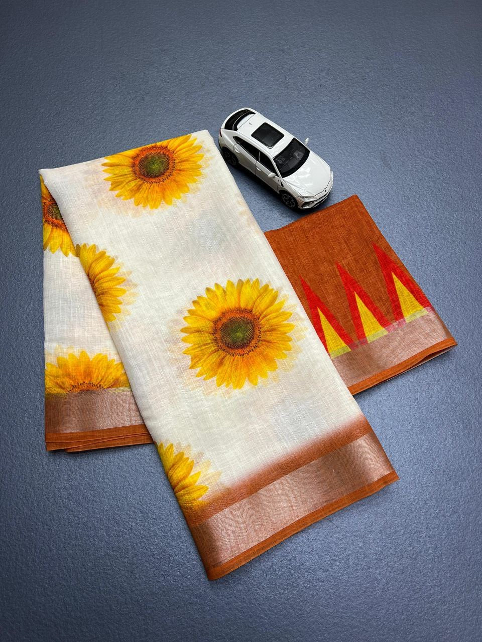 Flower Designed Linen With Zari Work Saree