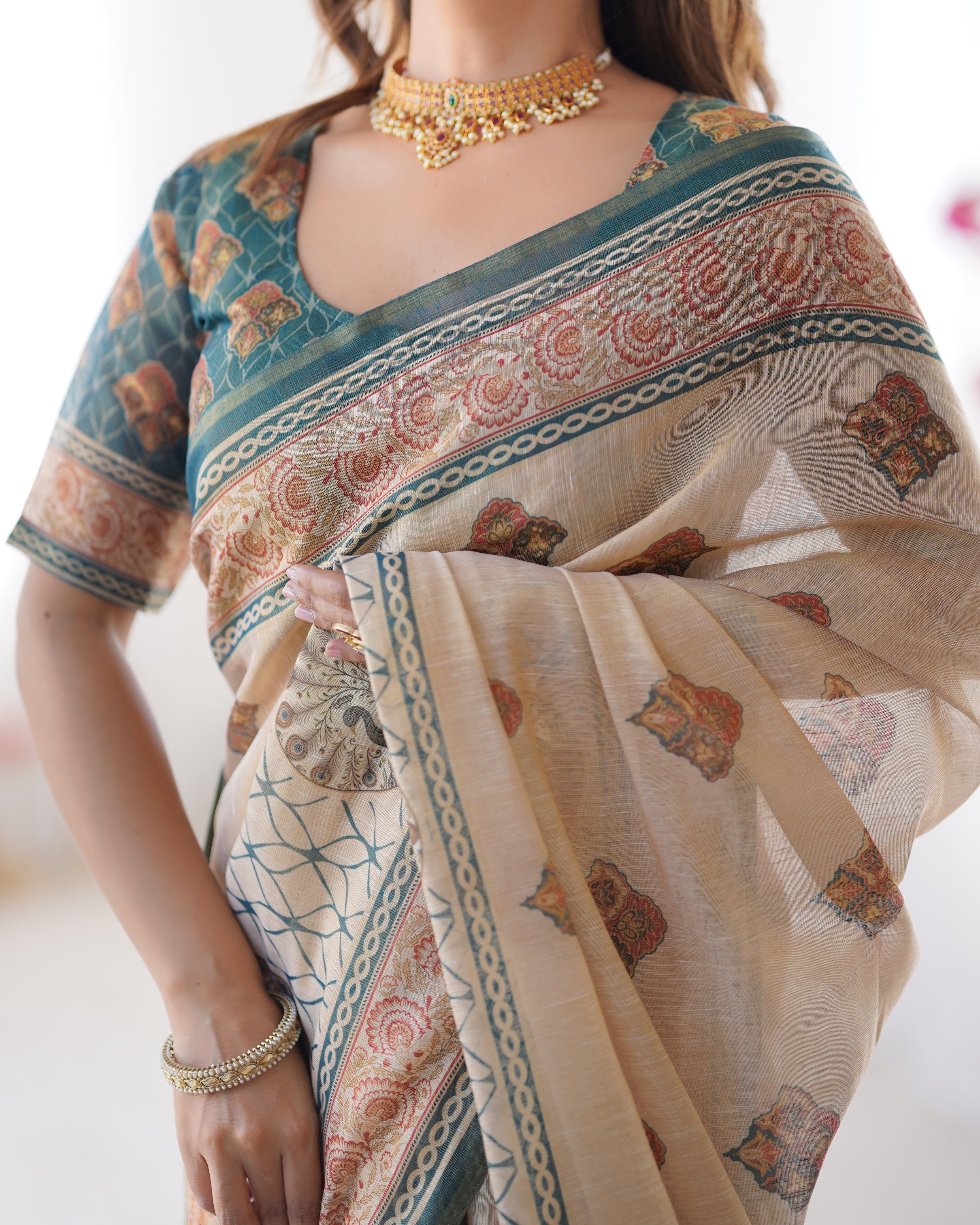 Cream base with Bottle Green & Rust accents Cotton Saree