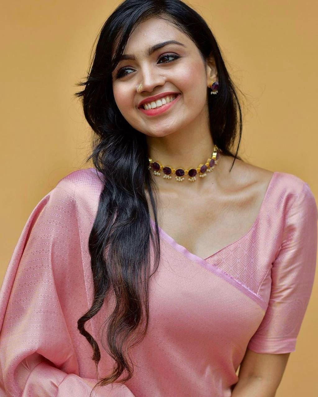 Model wearing pink lichi silk saree with chikan neck festive traditional Indian outfit