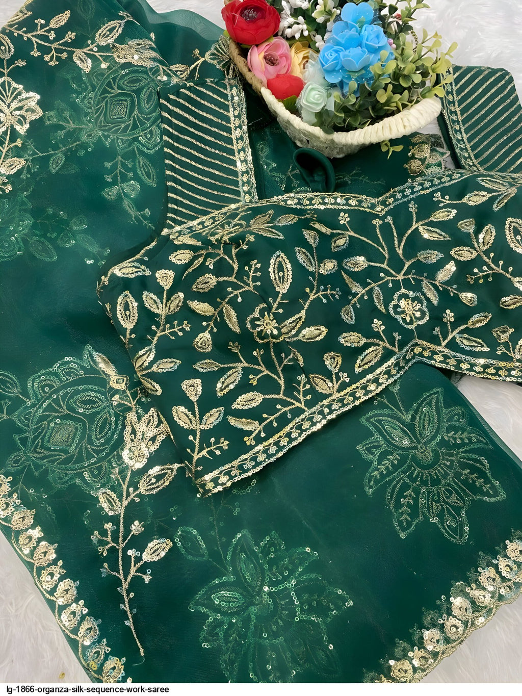 Folded green organza silk saree with heavy sequin embroidery – luxury wedding saree for women