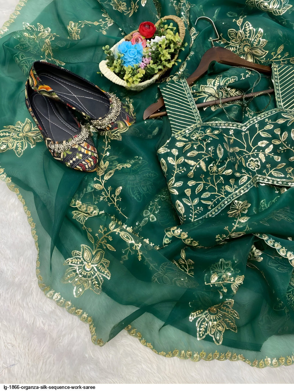 Matching blouse piece of green organza silk saree with sequin embroidery – festive designer saree